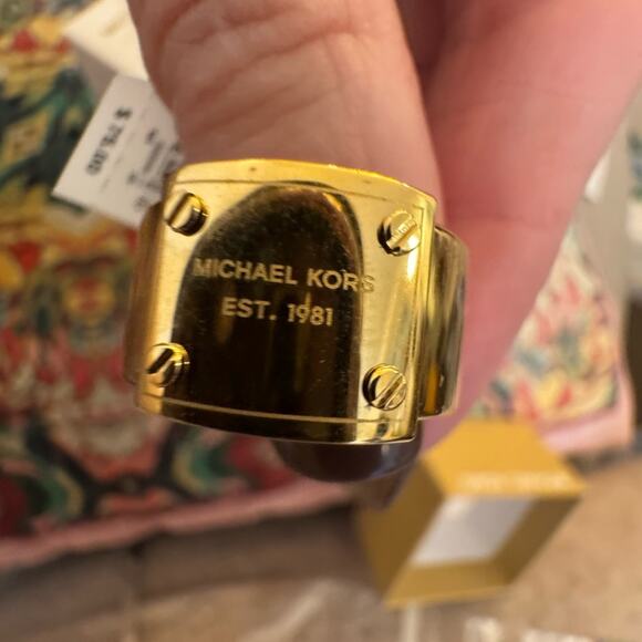 Michael Kors Gold Plated ring NIB  logo plaque riveted onto smaller band size 8 - Picture 1 of 5